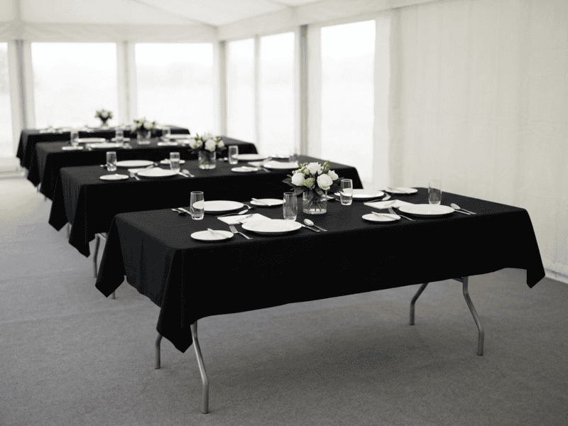 8 foot x 30 inch birchwood banquet table with black linen for corporate meeting under tent in Grandview Texas