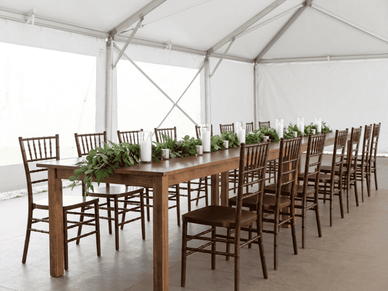 Fruitwood chiavari chair paired with farm table in Granbury TX — Boot & Barrel Event Co. rental