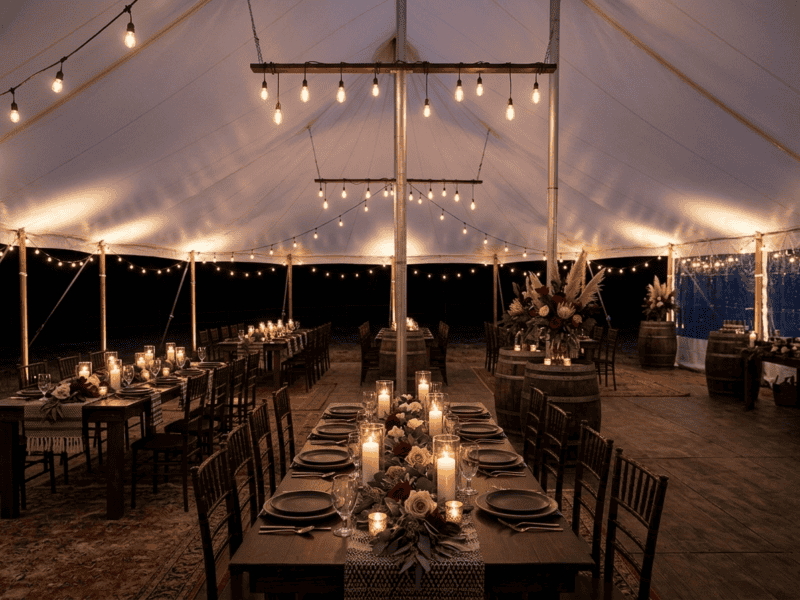 Fruitwood chiavari chair at night reception under tent in Grandview TX — Boot & Barrel Event Co. rental