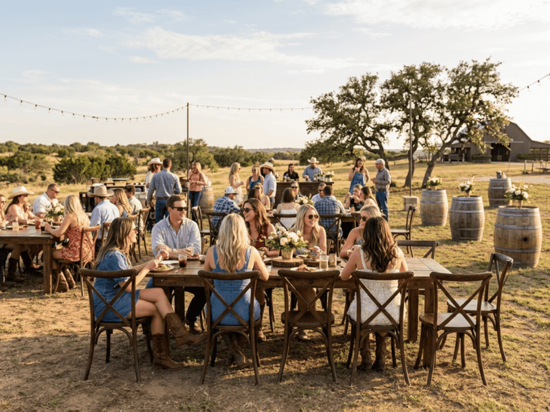 Fruitwood cross-back chair at outdoor event with guests in Godley TX — Boot & Barrel Event Co. rental