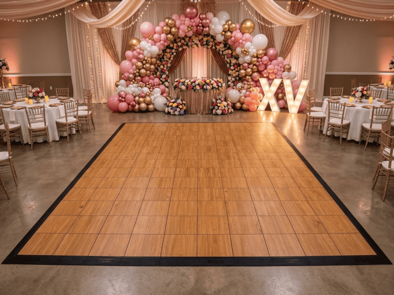 English chestnut indoor dance floor rental at a quinceanera venue with colorful festive decorations — Boot & Barrel Event Co. Glen Rose TX