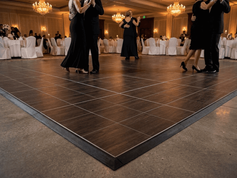 Espresso oak indoor dance floor rental with wedding guests dancing at a hotel ballroom reception — Boot & Barrel Event Co. Joshua TX