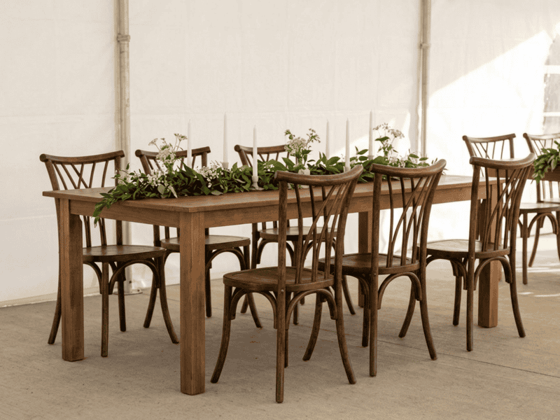 Fruitwood willow chair paired with farm table in Godley TX — Boot & Barrel Event Co. rental