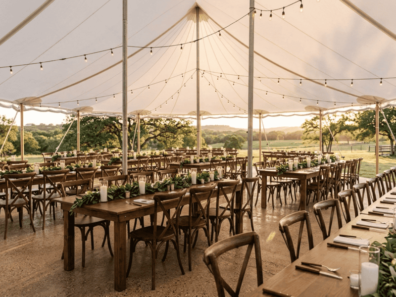 Fruitwood willow chair at wedding reception under tent in Granbury TX — Boot & Barrel Event Co. rental