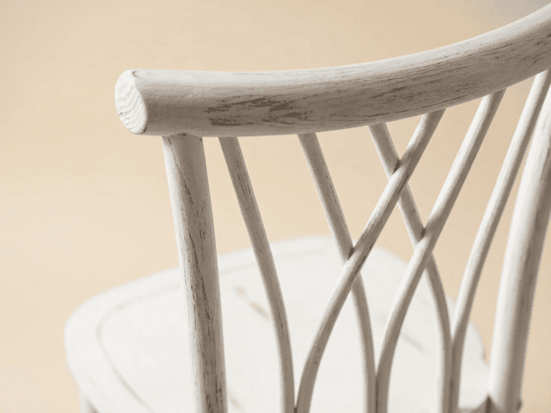 Distressed white willow chair detail shot in Texas — Boot & Barrel Event Co. rental